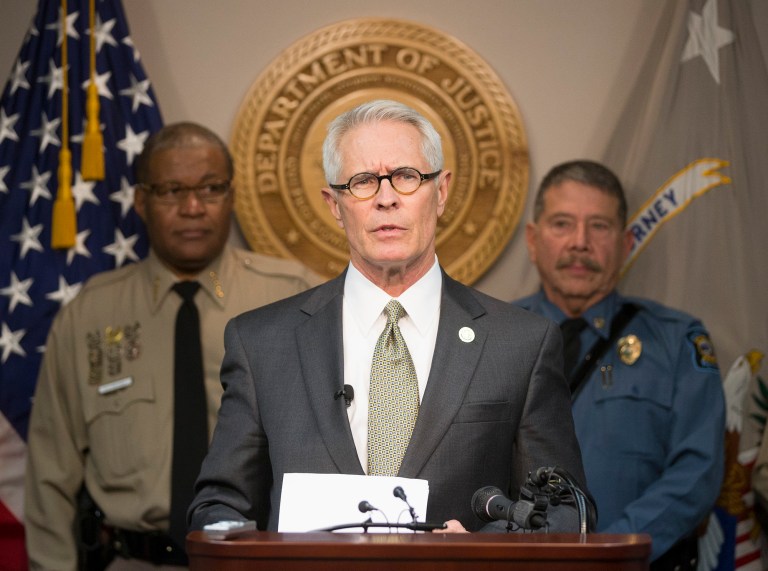 U.S. attorney Barry Grissom announces the arrest of Terry Lee Loewen, 58, of Wichita, Kan., during a news conference on Friday in Witchita, Kan. Grissom said Loewen was arrested Friday morning at Mid-Continent regional airport where he planned to drive a car that he believed was full of explosives into a terminal at the airport. (AP/The Wichita Eagle, Travis Heying)