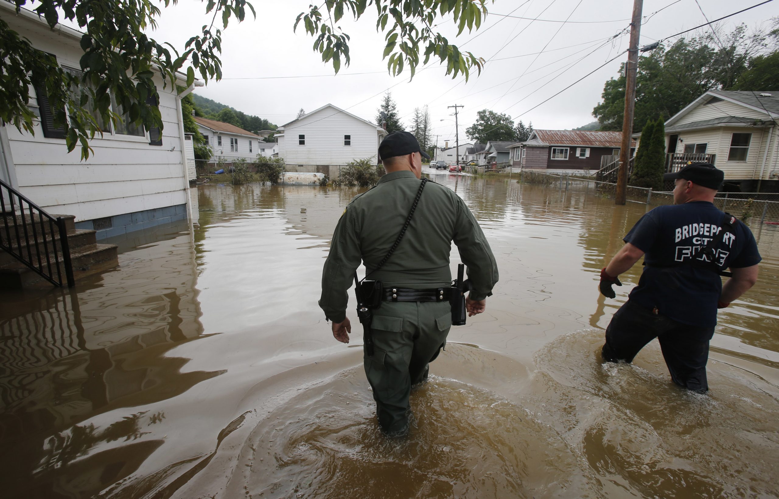 At least 26 dead after floods sweep West Virginia