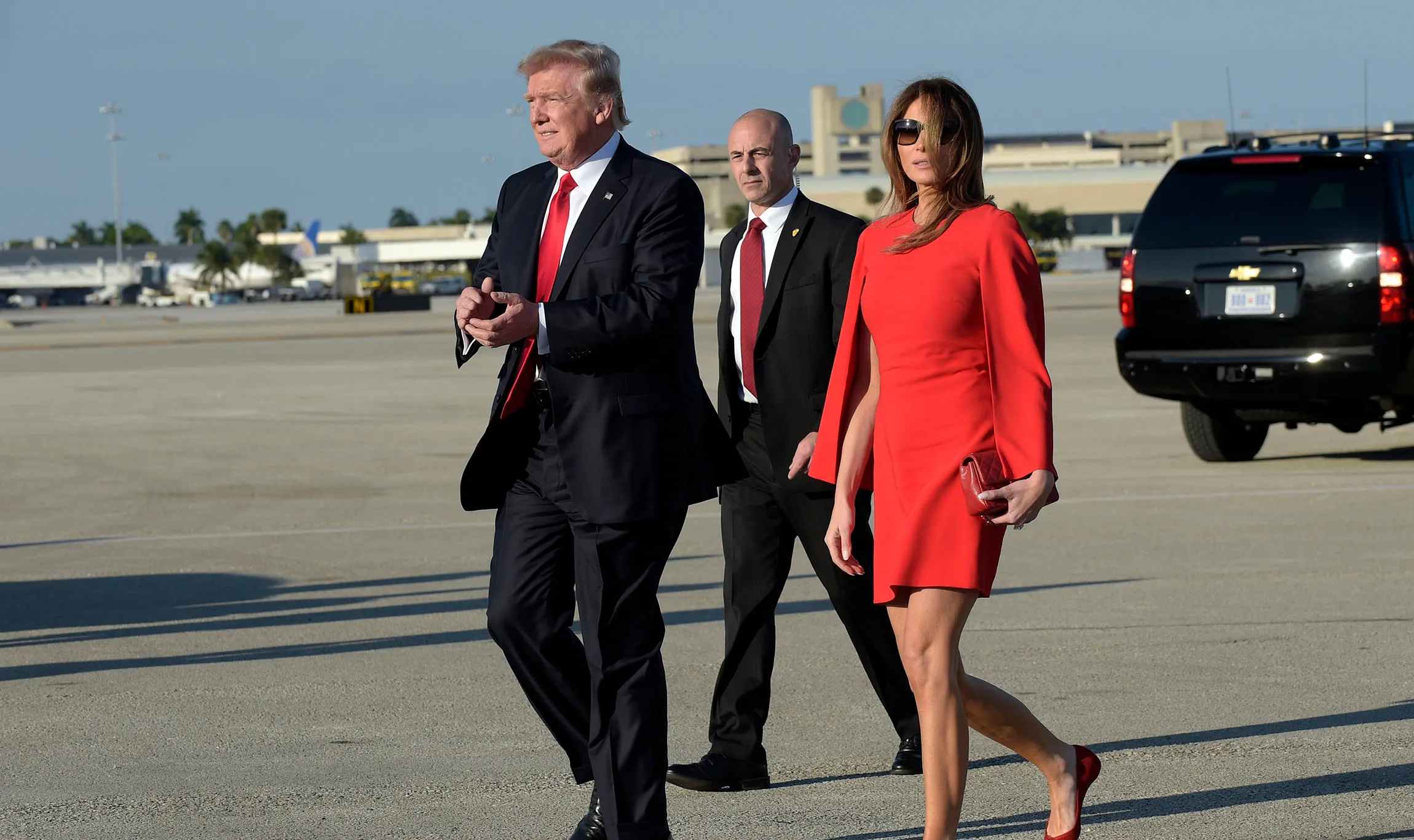 Wall of buses ready at Palm Beach airport in anticipation of Trump visit for Thanksgiving
