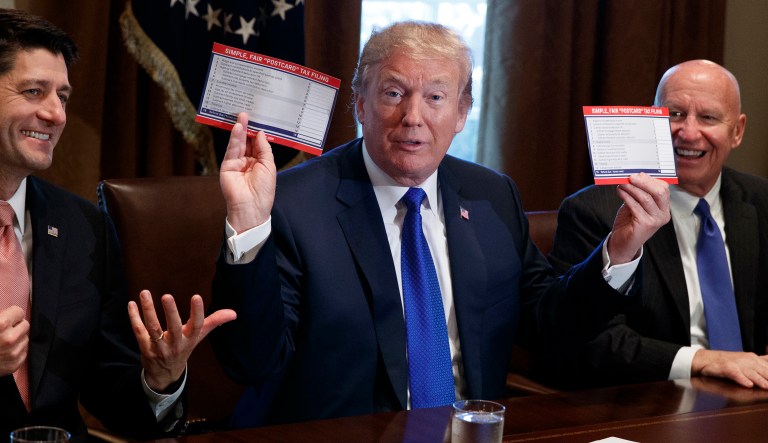 The SurveyMonkey poll shows that 51 percent of Americans now approve of the new law, while 46 percent remain opposed. (AP Photo/Evan Vucci)