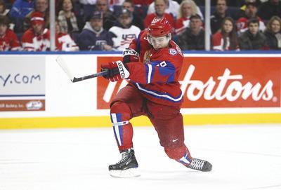 Tom Szczerbowski/Getty Images
Dmitry Orlov, who helped Russia win the world juniors title earlier this year, has seven or eight defensemen ahead of him with the Capitals.
