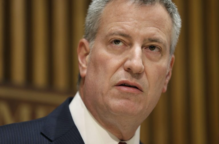 New York City Mayor Bill de Blasio said Friday he's behind Hillary Clinton in the 2016 White House race. (AP Photo/Seth Wenig)