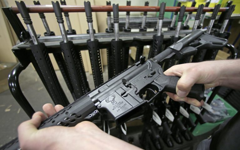 A newly assembled AR-15 rifle. (AP Photo/Charles Krupa)