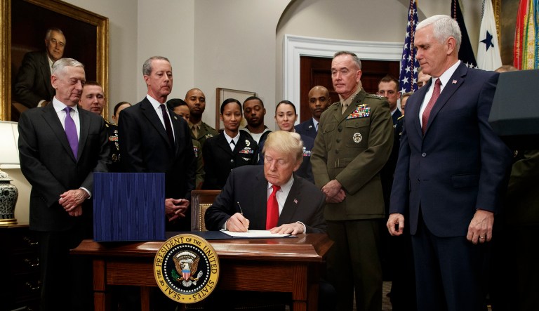 Last week, President Trump held a signing ceremony for the National Defense Authorization Act, a 2,400-page piece of legislation written by the Republican-led armed services committees in Congress. (AP Photo/Evan Vucci)