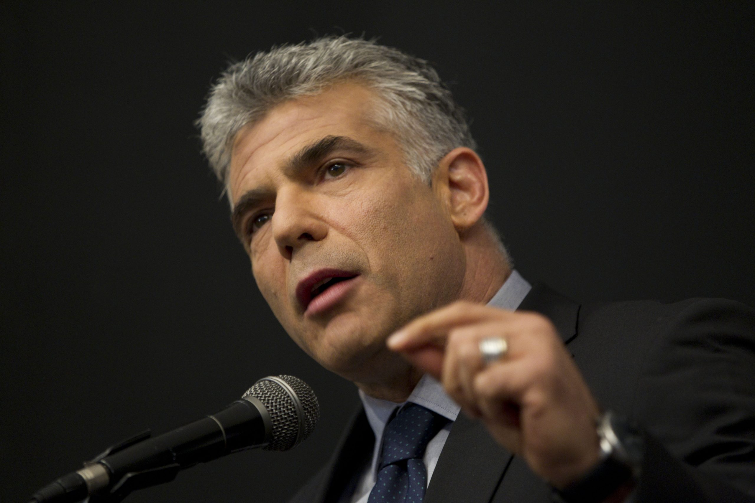 Lapid: Gaza aid should be tied to restored PA rule