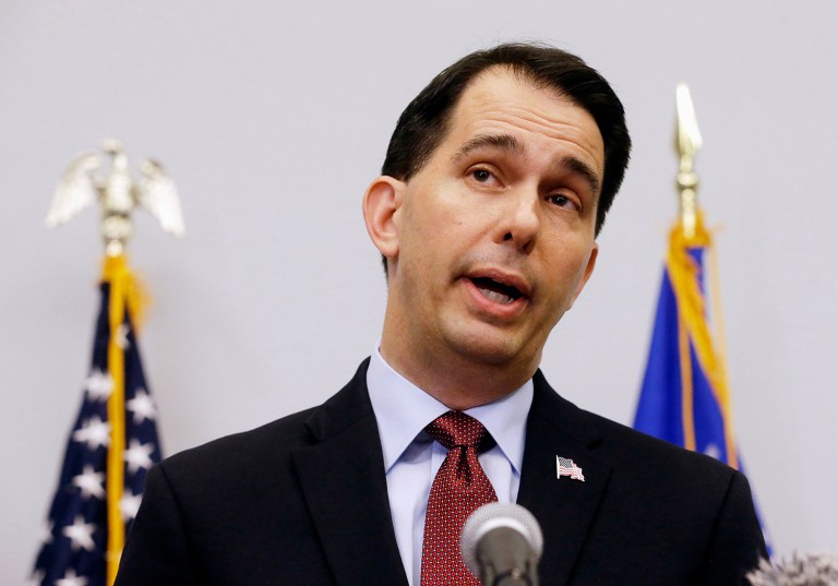 Wisconsin Gov. Scott Walker sought to distance himself from Donald Trump as the GOP's presumptive nominee. (AP Photo/Morry Gash, File)