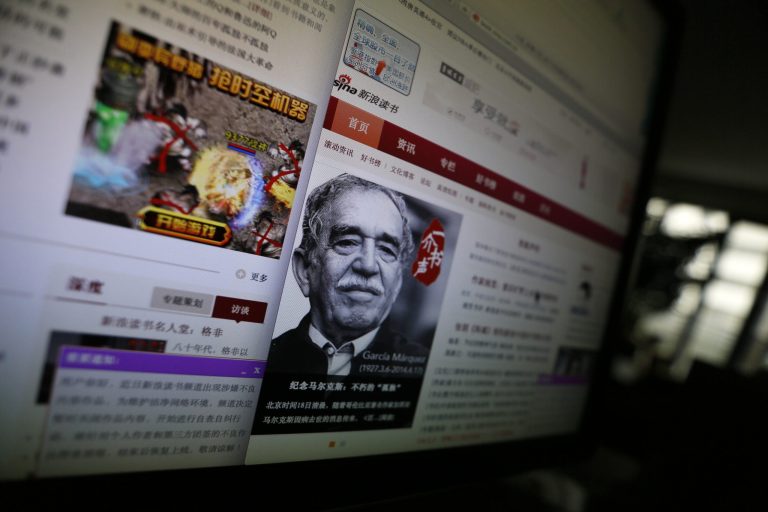 A purple dialog box announces the temporary closure of the literature site as it undergoes 