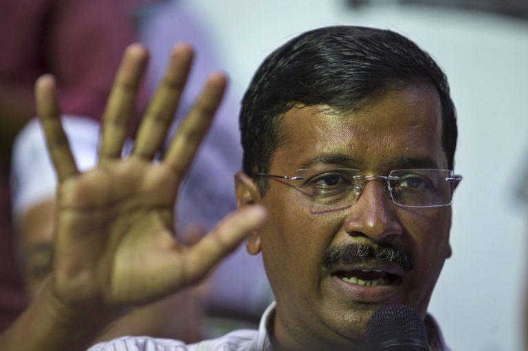 FILE- In this April 3, 2014 file photograph, India's Aam Aadmi Party (AAP), or common man party, chief Arvind Kejriwal speaks in New Delhi, India. Anti-corruption campaigner Kejriwal apologized Wednesday, May 21, 2014 for stepping down as New Delhi's top elected official just 49 days into the job, after his spectacular rise in the capital failed to translate into national prominence.(AP Photo/Tsering Topgyal, file)