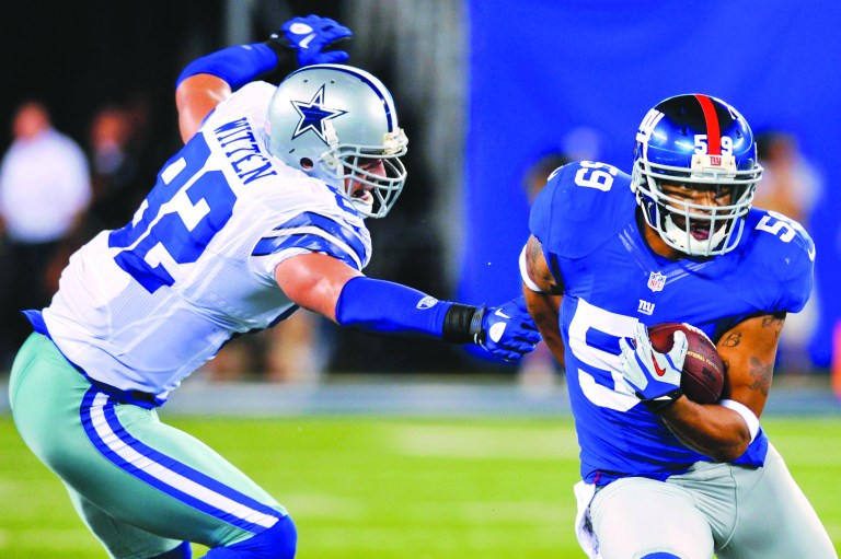 Bill Kostroun/AP
The Cowboys' Jason Witten played Wednesday even though he has a lacerated spleen.