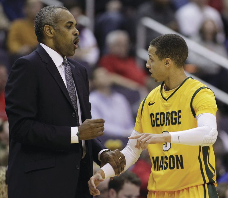 Luis M. Alvarez/AP
Paul Hewitt and Patrick Holloway helped George Mason finish fifth in the CAA this season, their last in the league before moving to the Atlantic 10 on July 1.