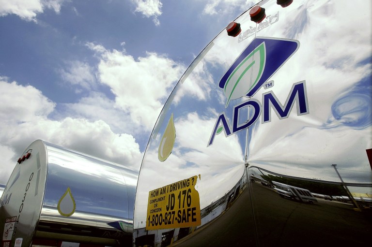  FILE - In this July 2, 2009 file photo, the ADM logo is seen on a tanker truck which carries mostly corn syrup at the Archer Daniels Midland Company plant in Decatur, Ill. Agribusiness conglomerate Archer Daniels Midland Co. announced Monday, Dec. 3, 2012, it is increasing its buyout offer for GrainCorp by almost 4 percent and disclosed it has already added to its stake in the Australian grain handler. (AP Photo/Seth Perlman, file)  