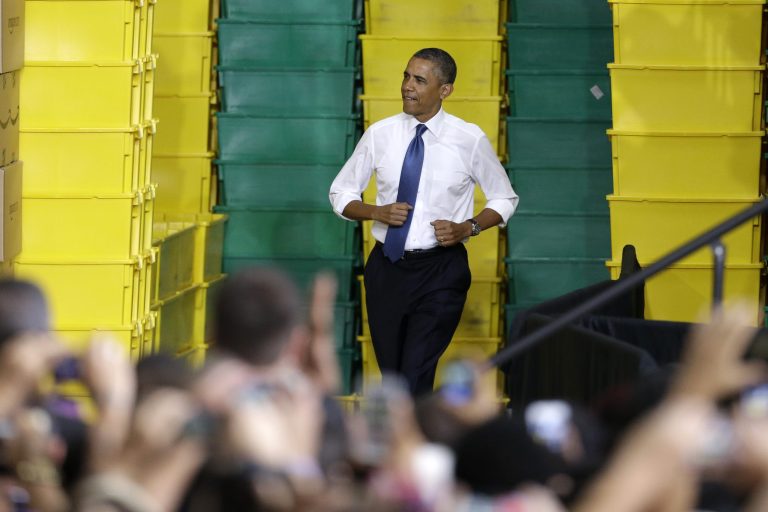 President Barack Obama arrives to speak at an Amazon.com distribution center on Tuesday, July 30, 2013, in Chattanooga, Tenn. Obama spoke on his proposals for private sector job growth and ways to strengthen the manufacturing sector. (AP Photo/Mark Humphrey)