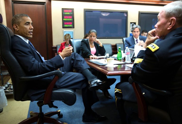 In this image released by The White House, President Barack Obama meets with the National Security Council  in the Situation Room of the White House, Thursday morning, Aug. 7, 2014, in Washington. (AP Photo/The White House, Pete Souza)
