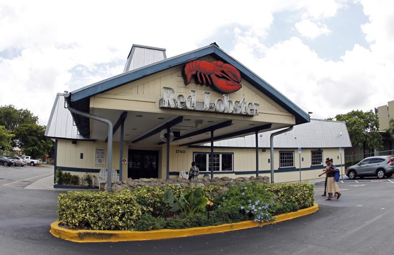   FILE - This Thursday, Sept. 6, 2012, file photo, shows a Red Lobster restaurant in Hialeah, Fla. After new ad campaigns touting the quality of its food failed to spark sales, Darden Restaurants, the parent company of Olive Garden and Red Lobster is retooling its strategy to attract diners with more promotional deals. (AP Photo/Alan Diaz, File)  