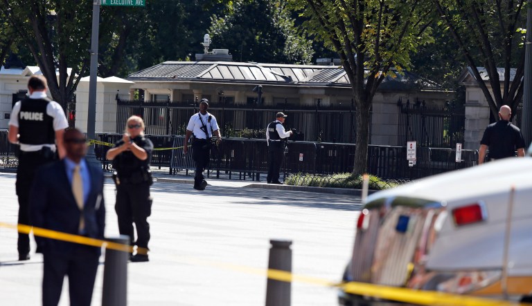 Members of the U.S. Secret Service investigate a suspicious package. 