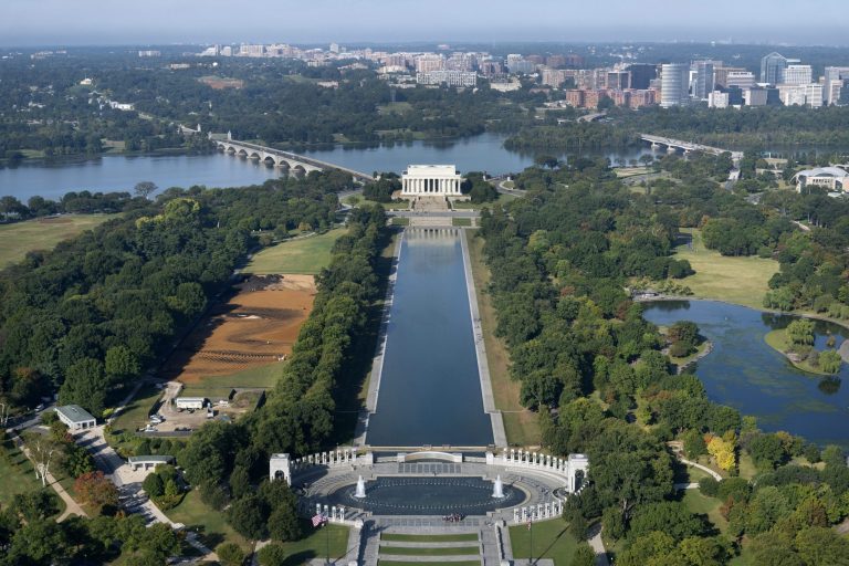 This undated photo provided by the Smithsonian and taken from the Washington Monument, shows a giant portrait of a young man, entitle: entitled: 