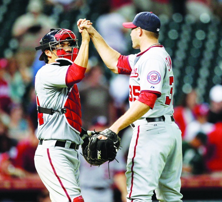Bob Levey/Getty Images
Nationals catcher Kurt Suzuki, left, has started two of the four games since being acquired from the A's via trade on Friday.