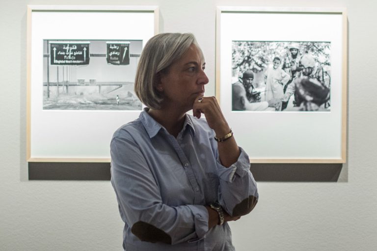 In this image taken Friday Sept. 11, 2011 AP photographer Anja Niedringhaus  attends an exhibition of her work in Berlin. Niedringhaus, 48, was killed and an AP reporter was wounded on Friday, April 4, 2014 when an Afghan policeman opened fire while they were sitting in their car in eastern Afghanistan. Niedringhaus an internationally acclaimed German photographer, was killed instantly, according to an AP Television freelancer who witnessed the shooting. Kathy Gannon, the reporter, was wounded twice and is receiving medical attention. (Photo/Markus Schreiber)