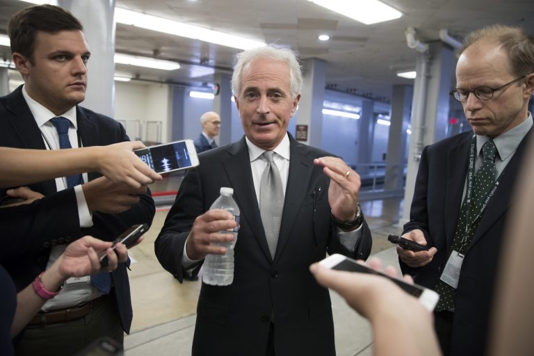 FILE - In this Sept. 26, 2017, file photo, Sen. Bob Corker, R-Tenn., chairman of the Senate Foreign Relations Committee, chats with reporters at the Capitol in Washington. Always one to speak his mind, Corker's new free agent status should make President Donald Trump and the GOP very nervous. The two-term Tennessee Republican isn't seeking re-election. And that gives him even more elbow room to say what he wants and vote how he pleases over the next 15 months as Trump and the party's top leaders on Capitol Hill struggle to get their agenda on track. (AP Photo/J. Scott Applewhite, File)
