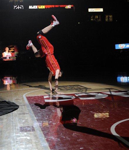 Maryland's Alex Len does a cartwheel during the NCAA college basketball team's Midnight Madness festivities, Friday, Oct. 14, 2011, in College Park, Md. 