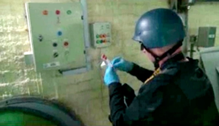 U.N. investigators found supplies such as acid-resistant tiles, valves and thermometers shipped from North Korea, in addition to North Korean missile technicians working in Syrian chemical weapons and missile facilities. (Syrian State Television via AP video, File)