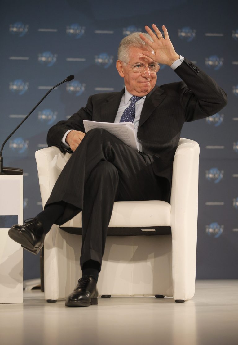   Prime Minister of Italy Mario Monti gestures during the World Policy conference in Cannes, southern France, Saturday, Dec. 8, 2012.(AP Photo/Lionel Cironneau)  