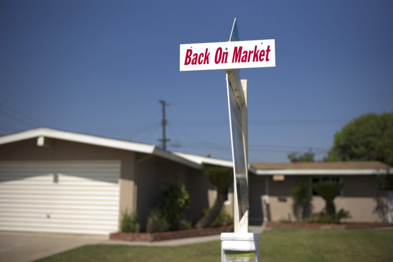 This Aug. 14, 2014 photo shows a sign in front of a home for sales in Whittier, Calif. Standard & Poor's releases the S&P/Case-Shiller index of home prices for July on Tuesday, Aug. 26, 2014. (AP Photo/Jae C. Hong)