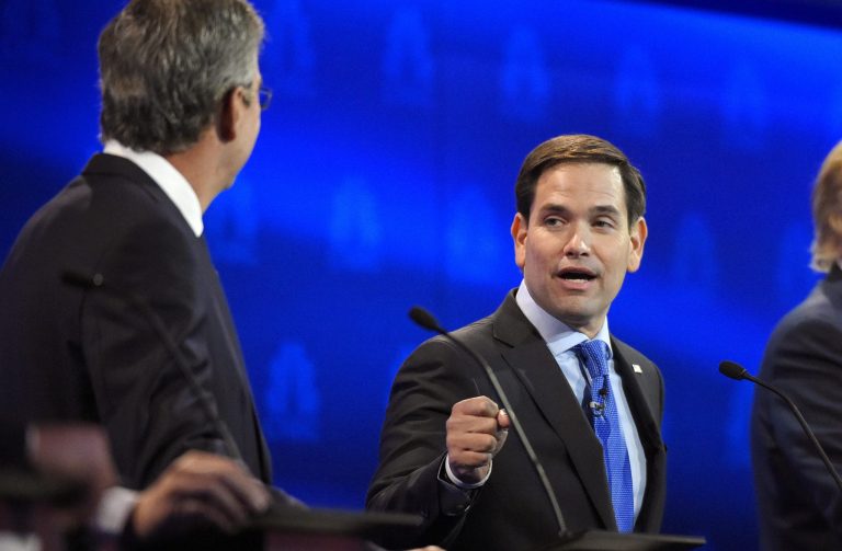 Marco Rubio, right, and Jeb Bush, argue a point during the CNBC Republican presidential debate at the University of Colorado, Wednesday, Oct. 28, 2015, in Boulder, Colo. (AP Photo/Mark J. Terrill)