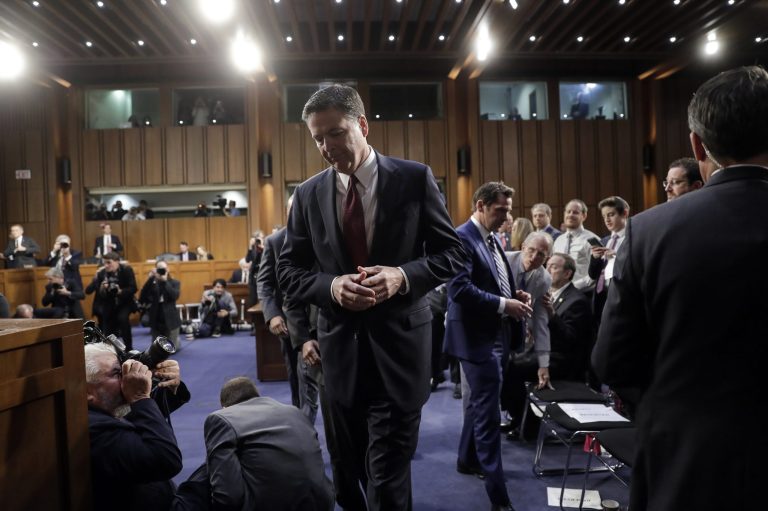 Fired FBI director James Comey departs an open hearing with the Senate Select Committee on Intelligence where he recounted a series of conversations with President Donald Trump as, on Capitol Hill in Washington, Thursday, June 8, 2017. (AP Photo/J. Scott Applewhite)