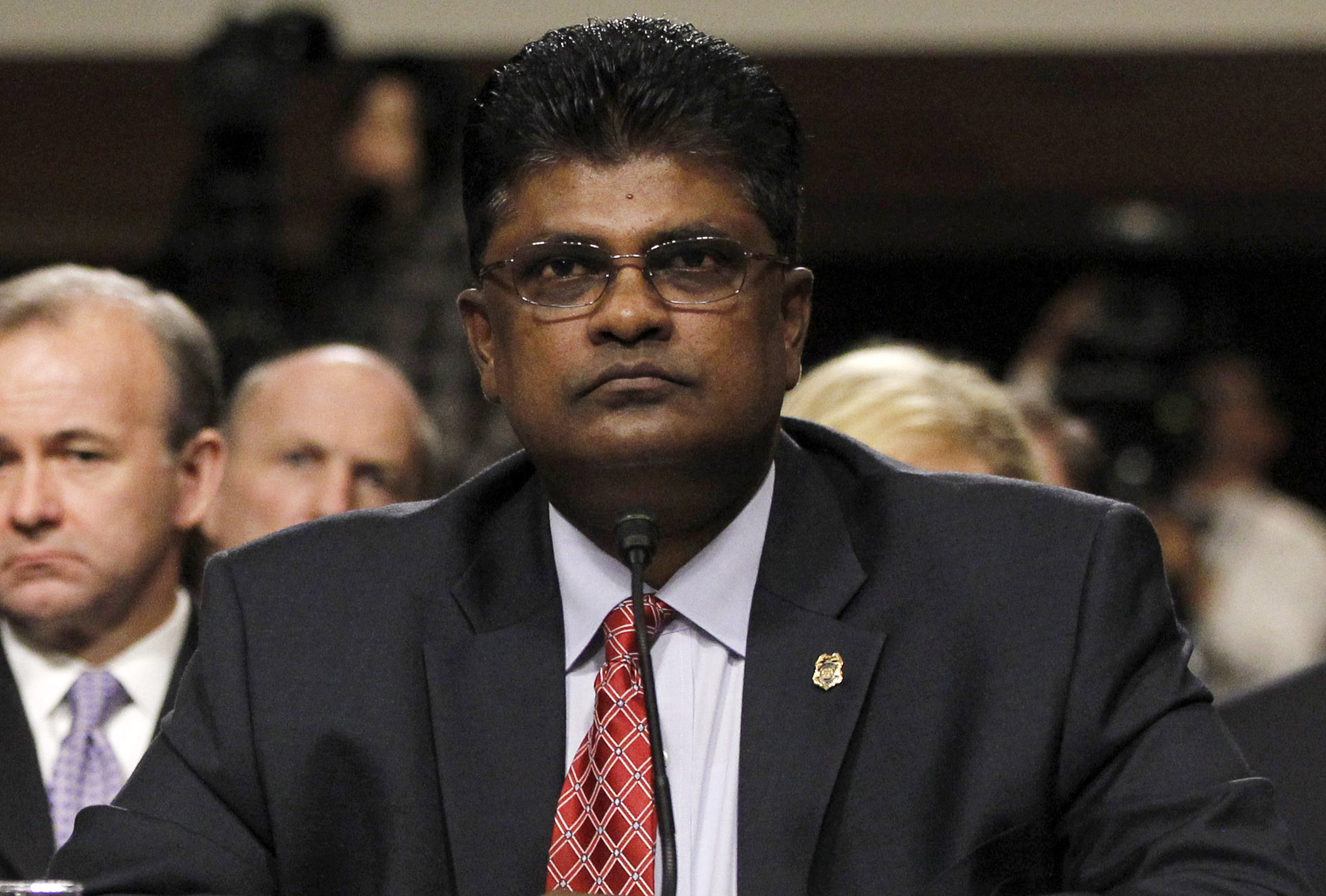 Former inspector general still on paid leave