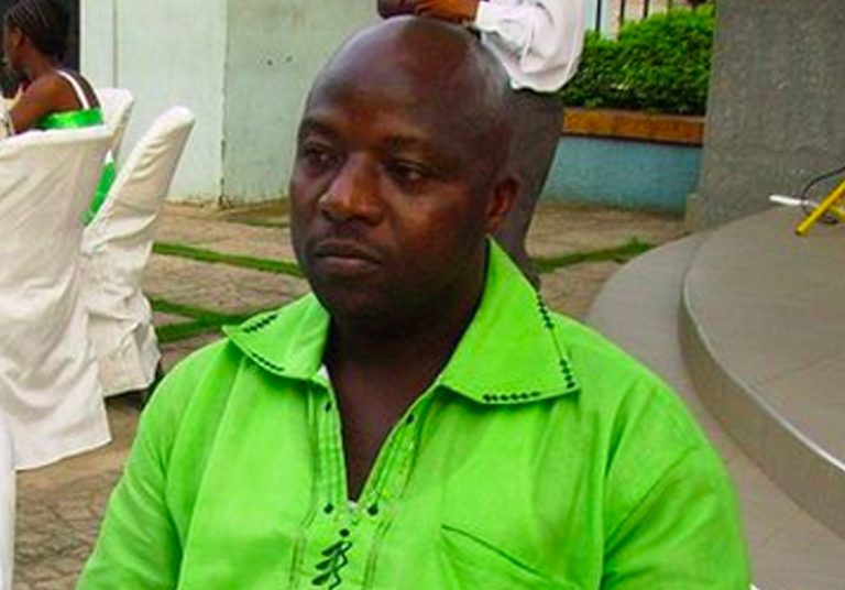 This 2011 photo provided by Wilmot Chayee shows Thomas Eric Duncan at a wedding in Ghana.  Duncan, who became the first patient diagnosed in the U.S with Ebola, has been kept in isolation at a hospital since Sunday, Sept. 28, 2014. He was listed in serious but stable condition. (AP Photo/Wilmot Chayee)