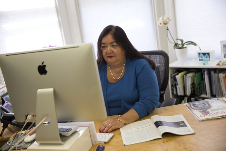 Jane Delgado, president of the National Alliance for Hispanic Health, works in her office in Washington, Monday, March 24, 2014. 