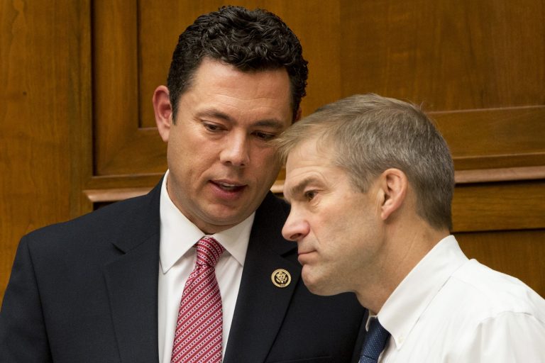 House Oversight and Government Reform Committee Chairman Rep. Jason Chaffetz, R-Utah, left, speaks with committee member Rep. Jim Jordan, R-Ohio, on Capitol Hill Washington, Tuesday, Sept. 29, 2015, during the committee's hearing on 