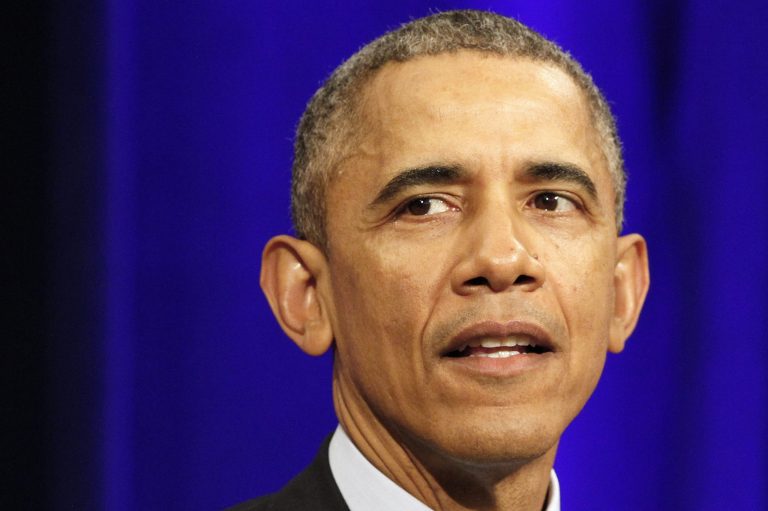 President Obama speaks about outgoing Attorney General Eric Holder at an event celebrating Holder at the Department of Justice in Washington, Friday, Feb. 27, 2015. (AP Photo/Jacquelyn Martin)