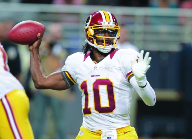 Tom Gannam/AP
Quarterback Robert Griffin III completed eight of 10 passes for 123 yards and a touchdown when he used play-action on Sunday.