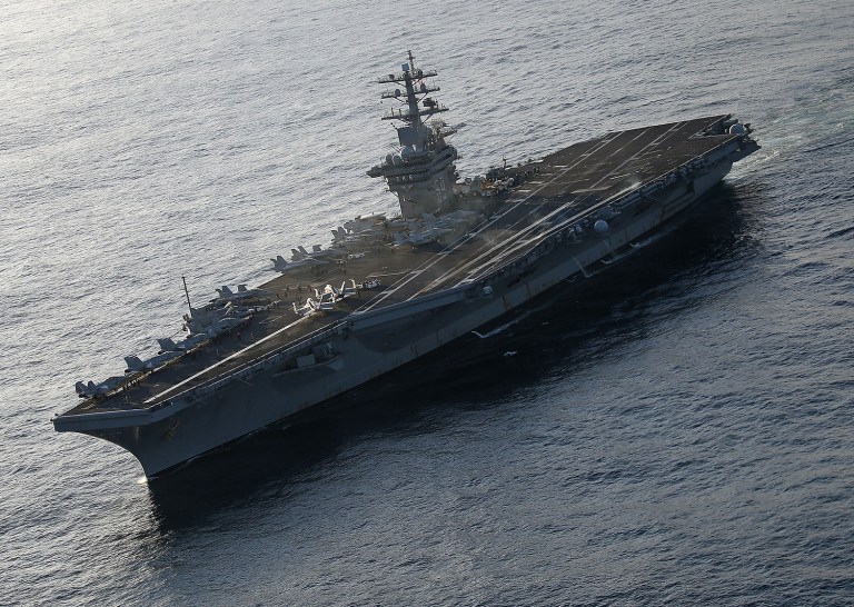 The carrier Dwight D. Eisenhower, which has been conducting operations against the Islamic State in the Middle East for the past seven months, is set to return to its home port in Norfolk, Va., on Friday, according to a Navy statement. (Photo by Mark Wilson/Getty Images)