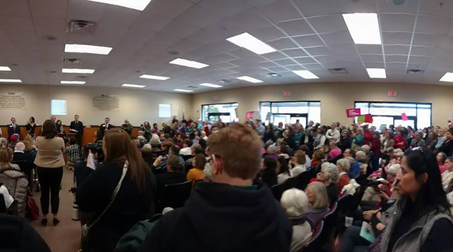 Before crashing casework workshop, Trump protesters hold dress rehearsal to hand out talking points, signs
