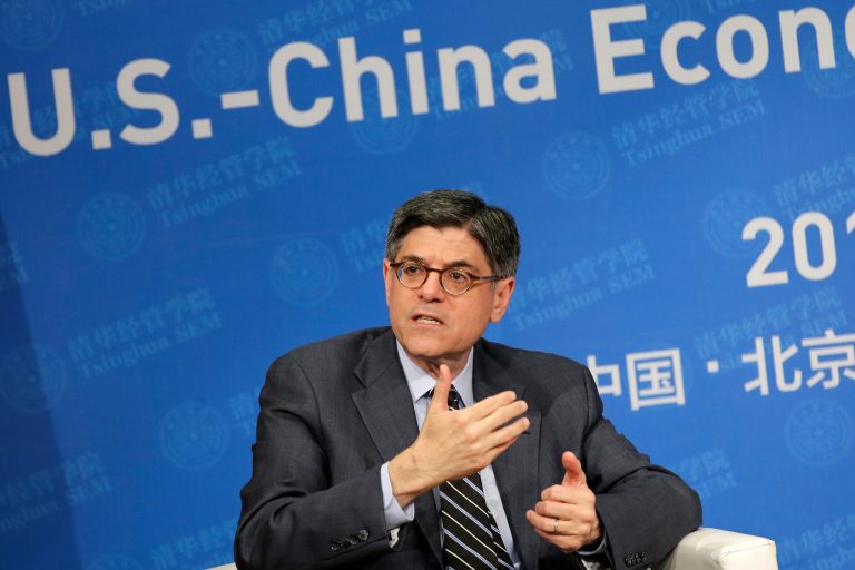 Treasury Secretary Jack Lew and congressional Republicans agree on the factors pushing companies out, especially the high 35 percent U.S. corporate tax rate and the unusual practice of applying that rate to all worldwide income. (AP Photo/Andy Wong)