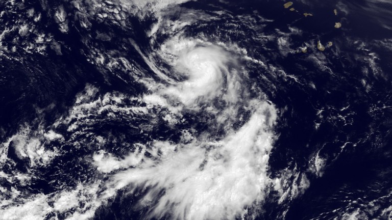   This handout photo provided by the National Oceanic and Atmospheric Administration (NOAA), taken July 24, 2013, shows Tropical Storm Dorian. Federal forecasters are slightly reducing their prediction for a busy Atlantic hurricane season. The Federal forecasters are slightly reducing their prediction for a busy Atlantic hurricane season. NOAA updated its hurricane season forecast Thursday, slightly cutting back the number of hurricanes they expect this year to somewhere between six and nine. updated its hurricane season forecast Thursday, slightly cutting back the number of hurricanes they expect this year to somewhere between six and nine. (AP Photo/NOAA)  