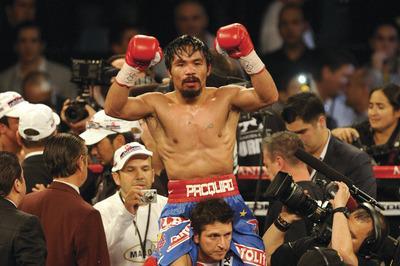 Ethan Miller/Getty Images
Manny Pacquiao won by decision over Juan Manuel Marquez on Saturday night.