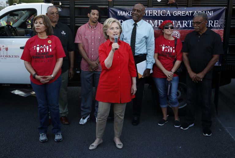 Democratic presidential candidate Hillary Clinton speaks during a rally Monday, Oct. 12, 2015, in Las Vegas, held by the Culinary Union to support a union drive at the Trump Hotel in Las Vegas. Donald Trump welcomed the publicity. (AP Photo/John Locher)