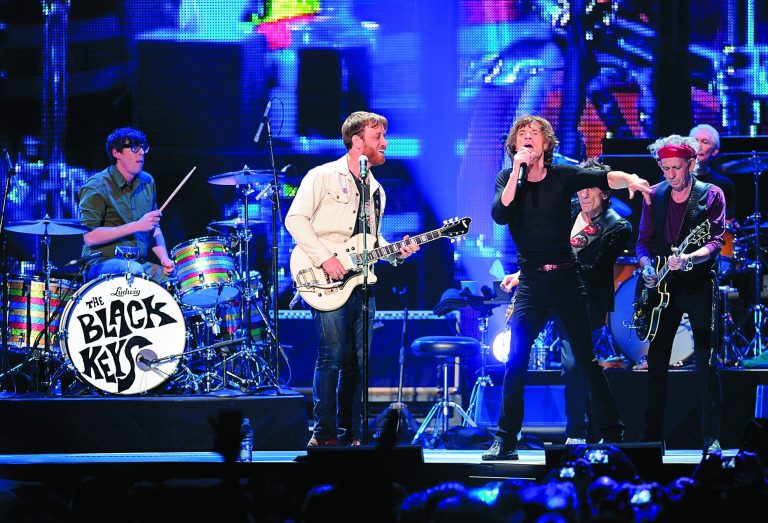 Drummer Patrick Carney, left, and guitarist Dan Auerbach of the Black Keys perform with members of The Rolling Stones, from left, Mick Jagger, Ronnie Wood, Keith Richards and Charlie Watts at the Prudential Center in Newark, NJ on Saturday, Dec. 15, 2012. (Photo by Evan Agostini/Invision/AP)