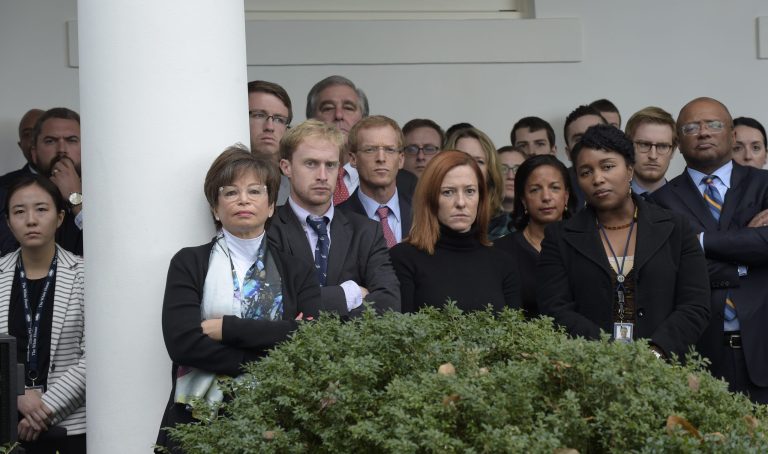 The daughter of Senior Adviser Valerie Jarrett, in front of the pillar, will be tasked with covering the Trump administration's Justice Department for CNN. (AP Photo/Susan Walsh)