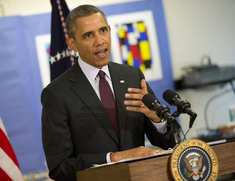 President Barack Obama answers a question regarding the ongoing situation in the Ukraine during his visit to Powell Elementary School in the Petworth neighborhood of Washington, Tuesday, March 4, 2014, where he went to discuss his fiscal 2015 federal budget proposels. AP Photo/Pablo Martinez Monsivais)