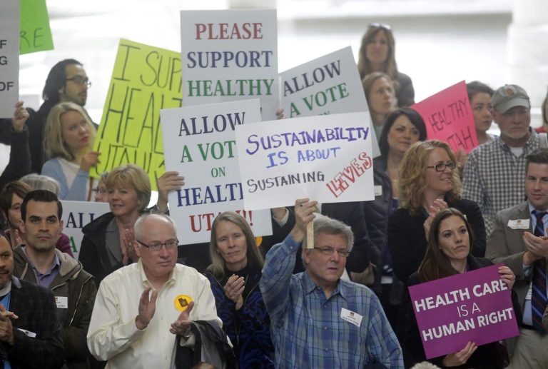 Florida and Texas residents reported significantly higher uninsured rates than New York and California, according to a new study. (AP Photo)