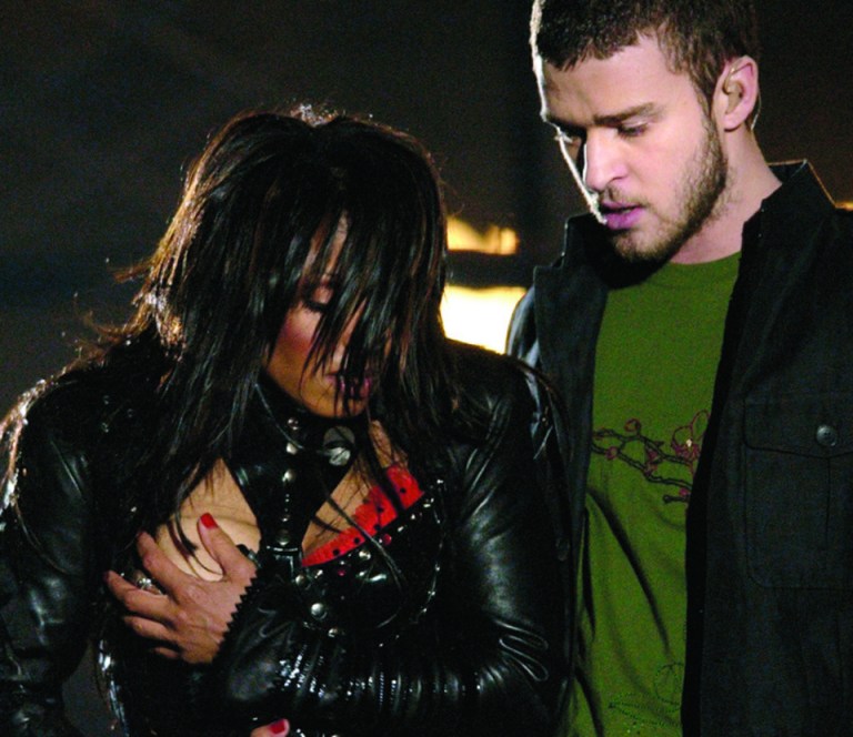 FILE - In this Sunday Feb. 1, 2004 file photo, entertainer Janet Jackson, left, covers her breast after her outfit came undone during the half time performance with Justin Timberlake at Super Bowl XXXVIII in Houston. The Supreme Court unanimously threw out fines and sanctions Thursday against broadcasters who violated the Federal Communications Commission policy regulating curse words and nudity on broadcast television. But the justices declined to issue a broad ruling on the constitutionality of the FCC indecency policy. Instead, the court concluded only that broadcasters could not have known in advance that obscenities uttered during awards show programs and a brief display of nudity on an episode of ABC's NYPD Blue could give rise to sanctions. ABC and 45 affiliates were hit with proposed fines totaling nearly $1.24 million. The stepped-up indecency enforcement, including issuing record fines for violations, also was spurred in part by widespread public outrage following Janet Jackson's breast-baring performance during the 2004 Super Bowl halftime show on CBS. (AP Photo/David Phillip, File)