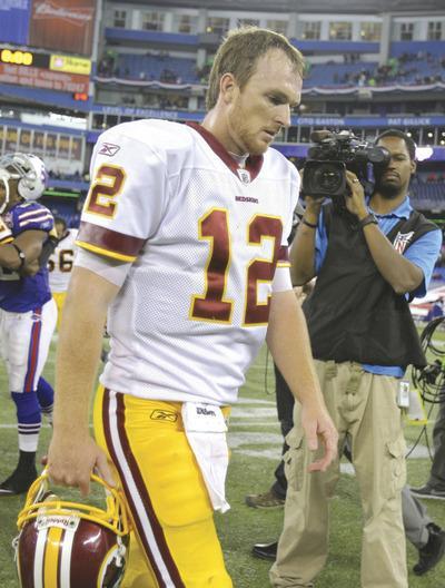 Tom Szczerbowski/Getty Images
Washington quarterback John Beck was benched after starting three games, all losses for the Redskins.