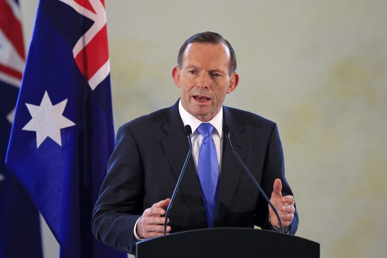 FILE - Australian Prime Minister Tony Abbott speaks during a joint press conference with his Malaysian counterpart Najib Razak after a meeting in Putrajaya, Malaysia, in this Saturday, Sept. 6, 2014 file photo. Australia is preparing to contribute up to 10 military aircraft to the increasingly aggressive campaign against the Islamic State extremists in Syria and Iraq. Abbott said Sunday Sept. 14, 2014 in a statement that Australia was responding to a formal request from the United States for specific contributions to the international coalition. (AP Photo/Lai Seng Sin, File)