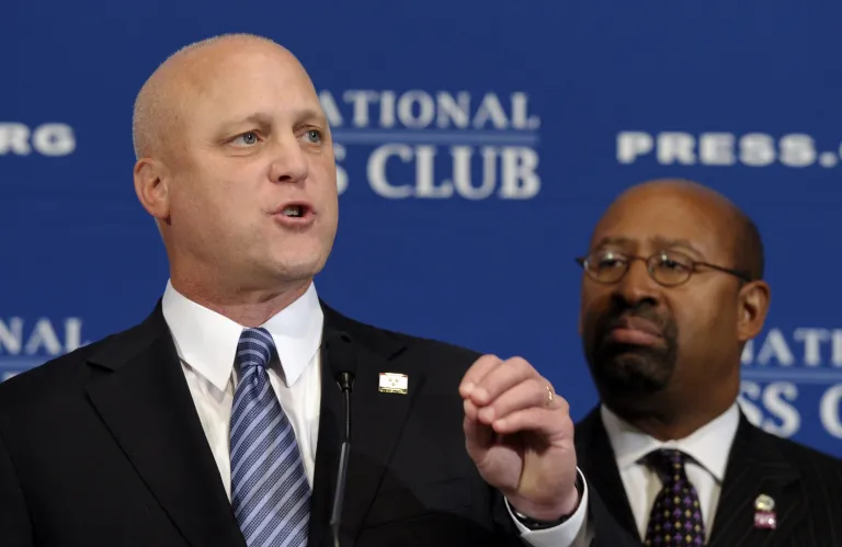 New Orleans Mayor Mitch Landrieu, left, speaks at the National Press Club in Washington on Sept. 26. 