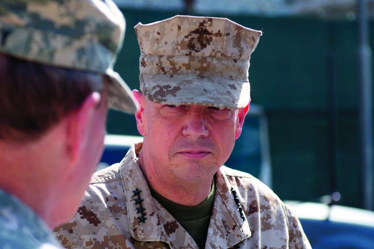 In this image released by the U.S. Department of Defense and taken Monday, Aug. 20, 2012, Marine Gen. John Allen, International Security Assistance Force (ISAF) Commander, meets with Army Gen. Martin E. Dempsey, chairman of the Joint Chiefs of Staff, unseen in Kabul, Afghanistan. (AP Photo/D. Myles Cullen, Department of Defense)